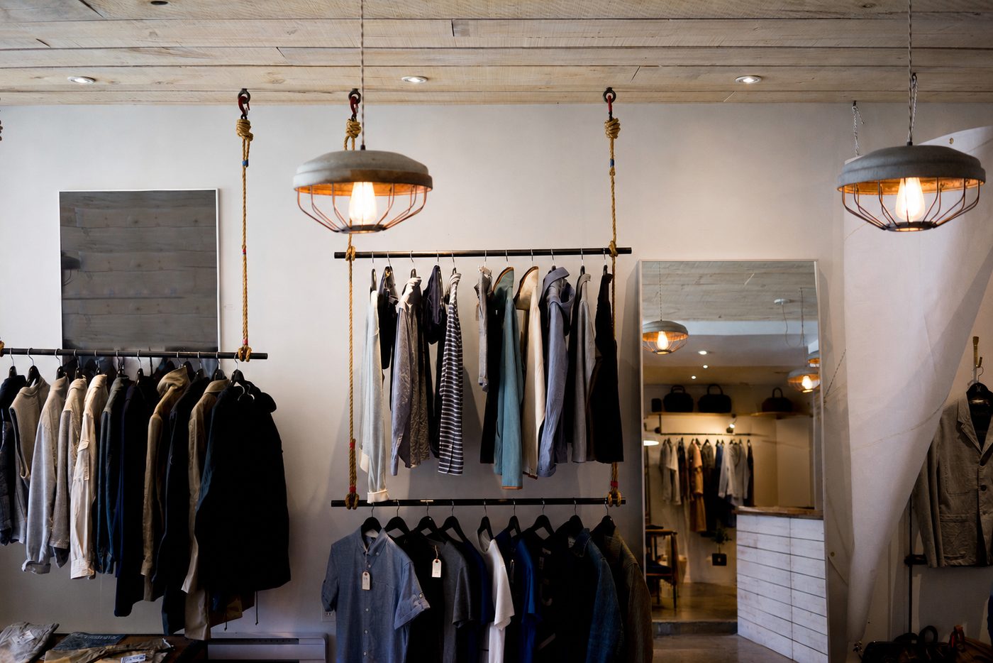 Curated menswear hanging in the Lost & Found store